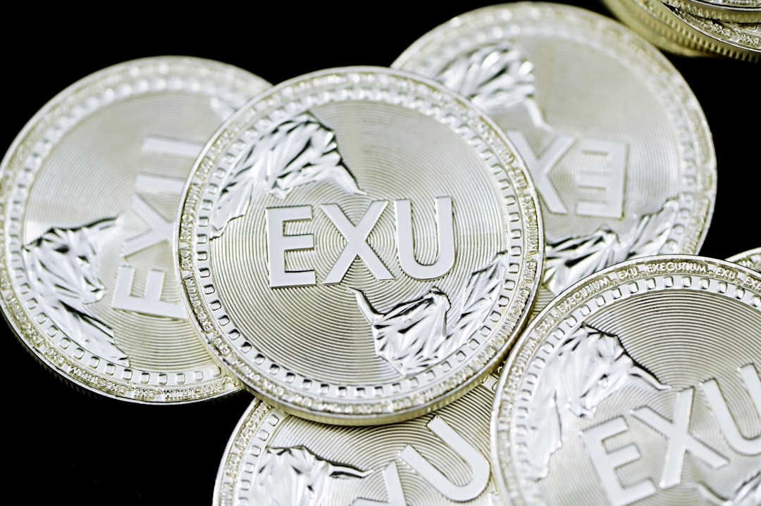 a pile of silver mexican peso coins