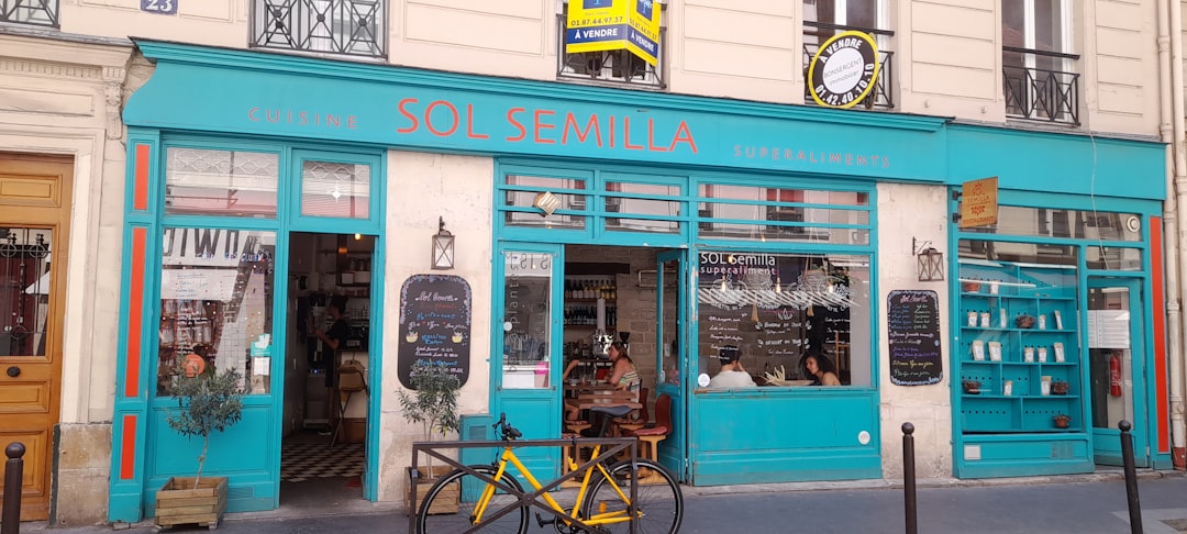 a bike is parked outside of a store